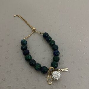 NWOT Adjustable bracelet with charms